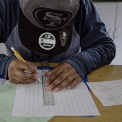 A student practices graphing in Algebra I at Rudsdale Newcomer High School in Oakland. Anne Wernikoff for EdSource